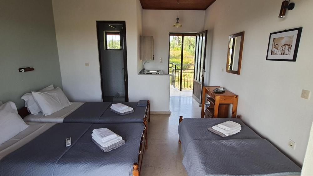 Palmyra Studios Kavos Luaran gambar